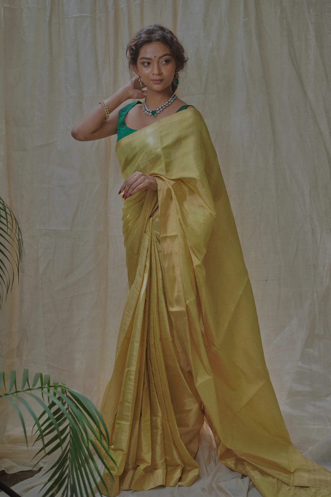 yellow tissue silk saree in gold zari