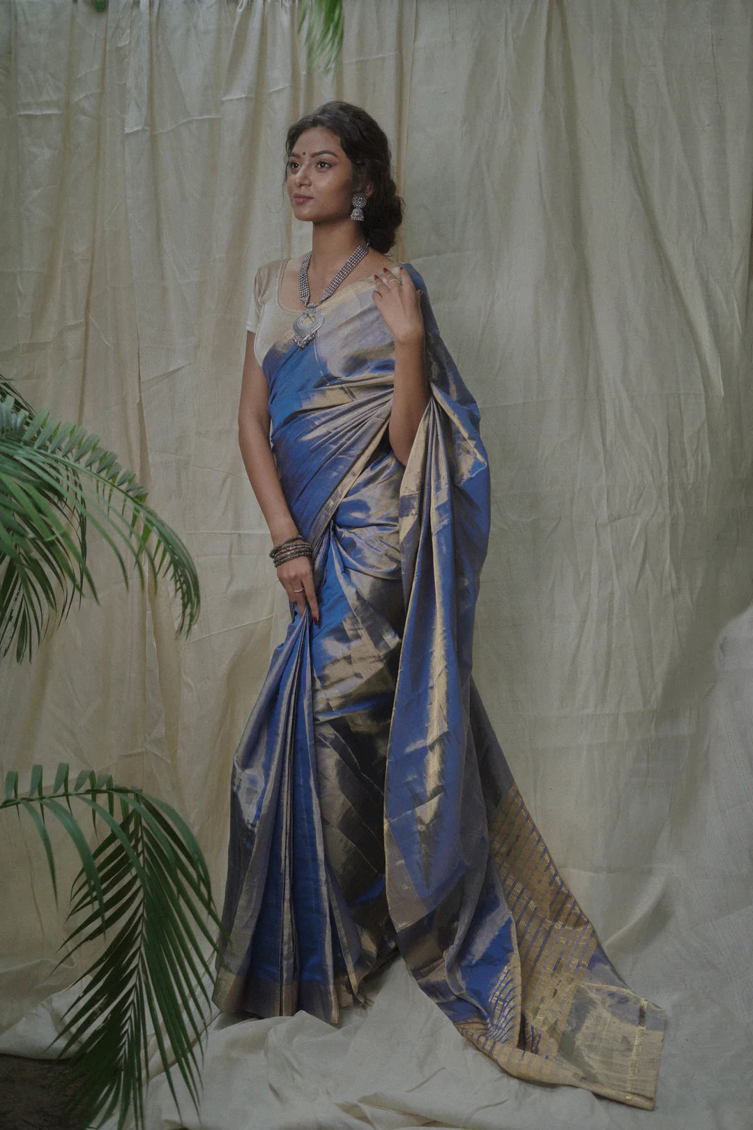 blue tissue silk saree in gold zari