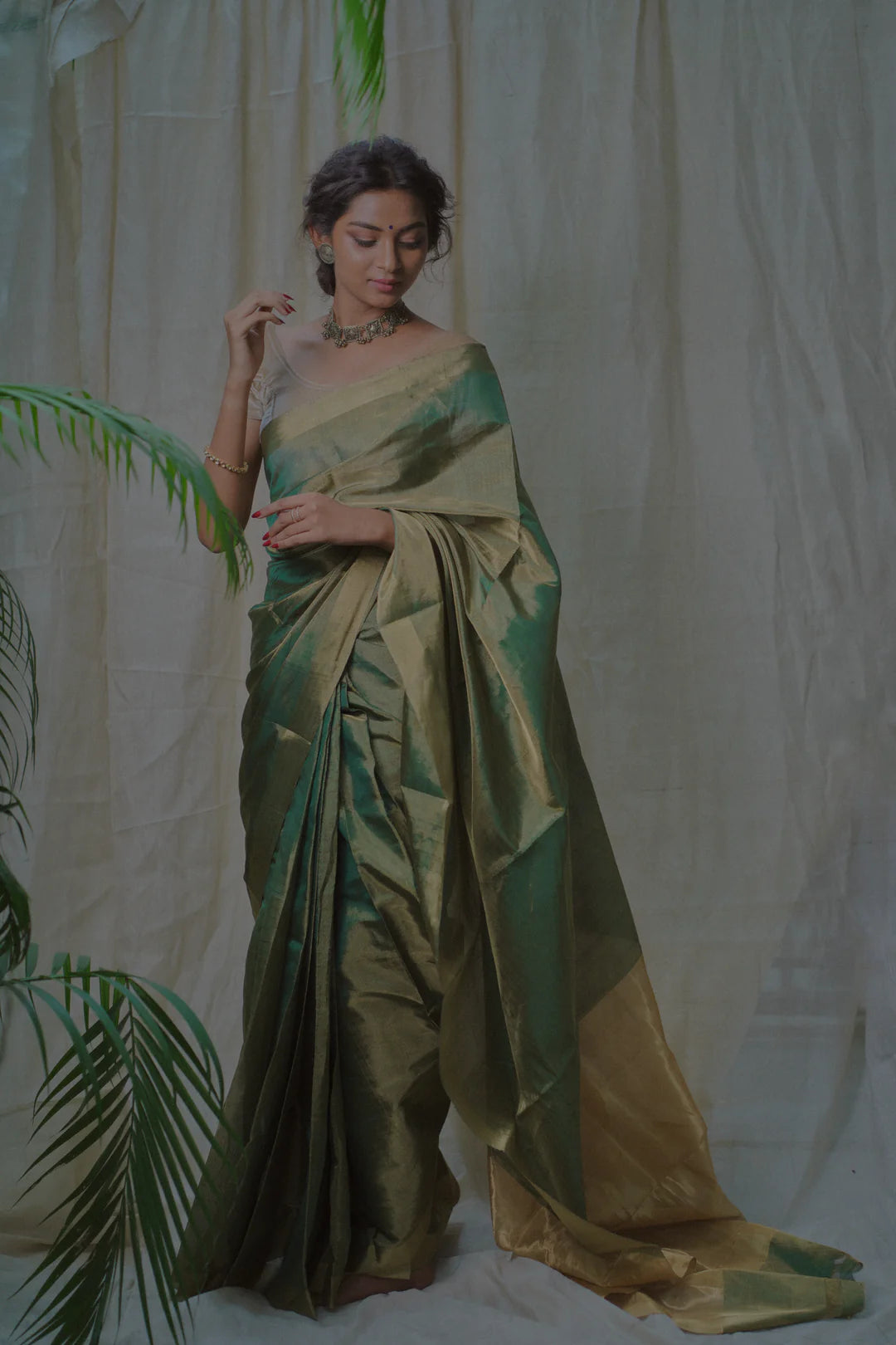 green tissue silk saree in gold zari