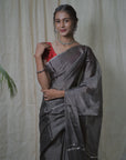 CHARCOAL GRAY  TISSUE SILK SAREE IN SILVER ZARI