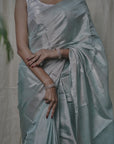 AQUA BLUE TISSUE SILK SAREE IN SILVER ZARI