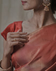 red tissue silk saree in gold zari