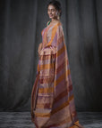 MULTICOLORED TISSUE SILK SAREE IN GOLD ZARI