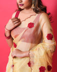 yellow organza silk saree with red resham roses