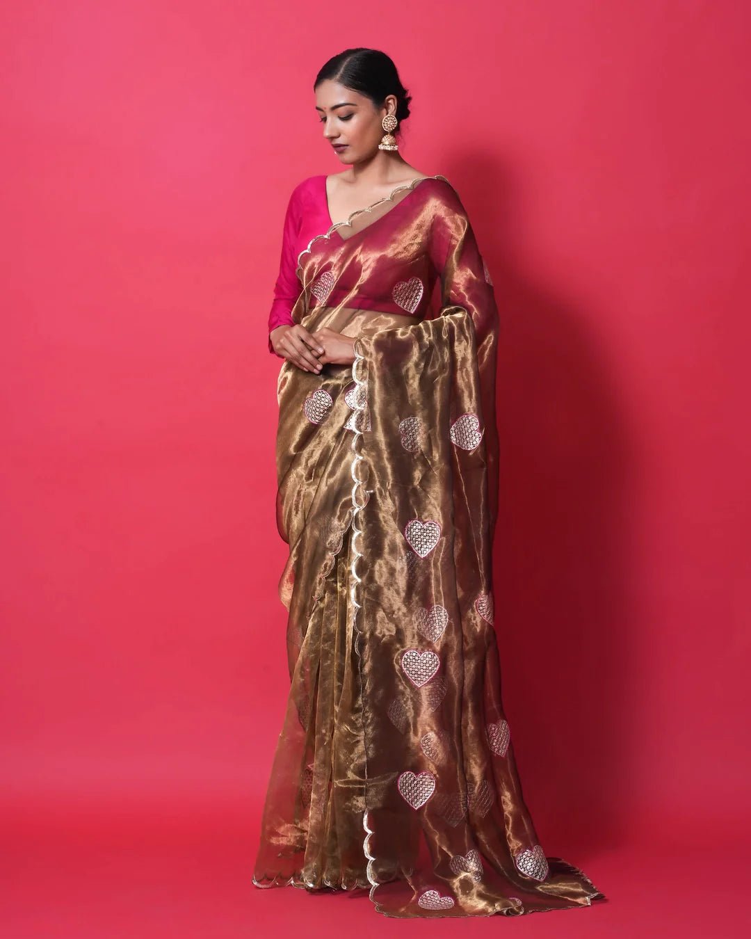 golden bronze tissue silk saree with silver zari hearts