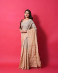 beige and silver tissue silk saree with silver resham hearts