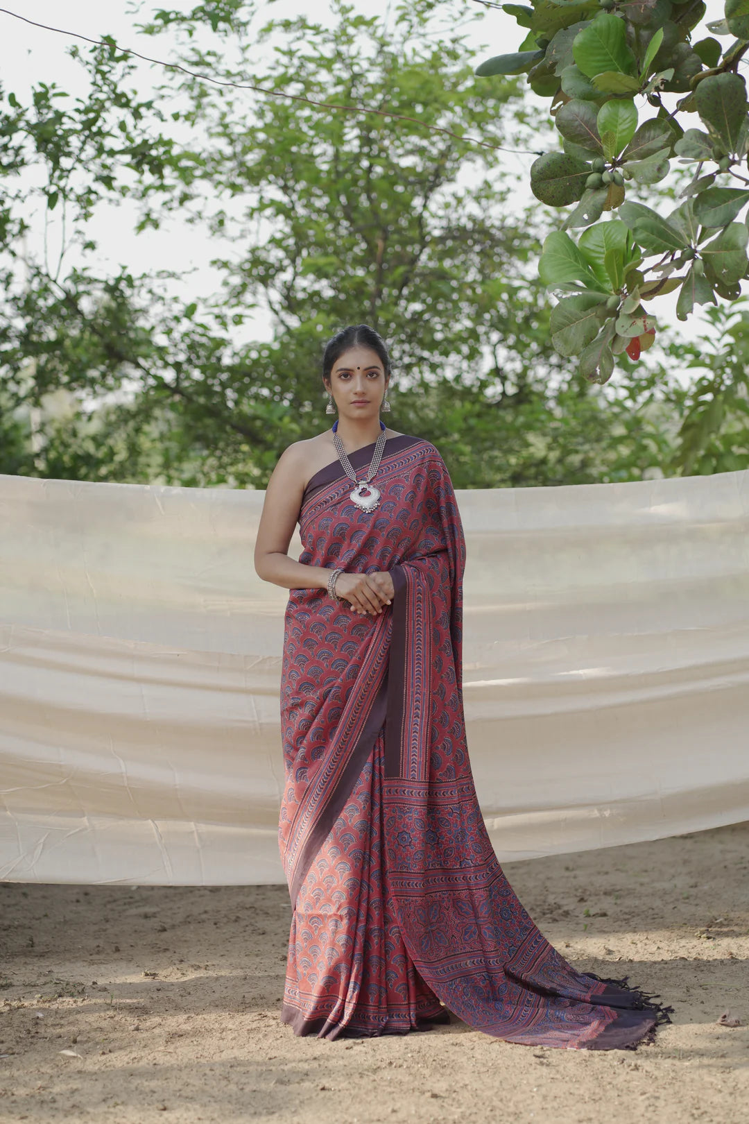 red handblock print saree in mulberry silk