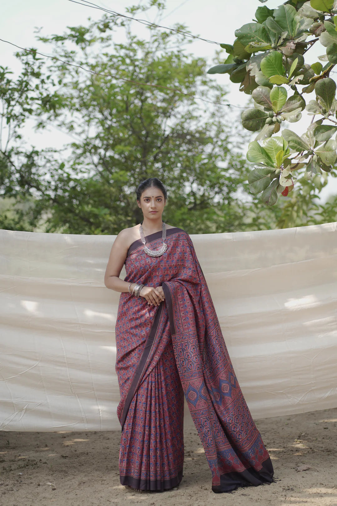 red handblock print saree in mulberry silk